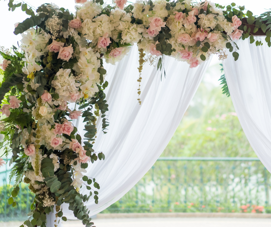 Atlanta wedding venue ceremony arch covered in luxury flowers in spring